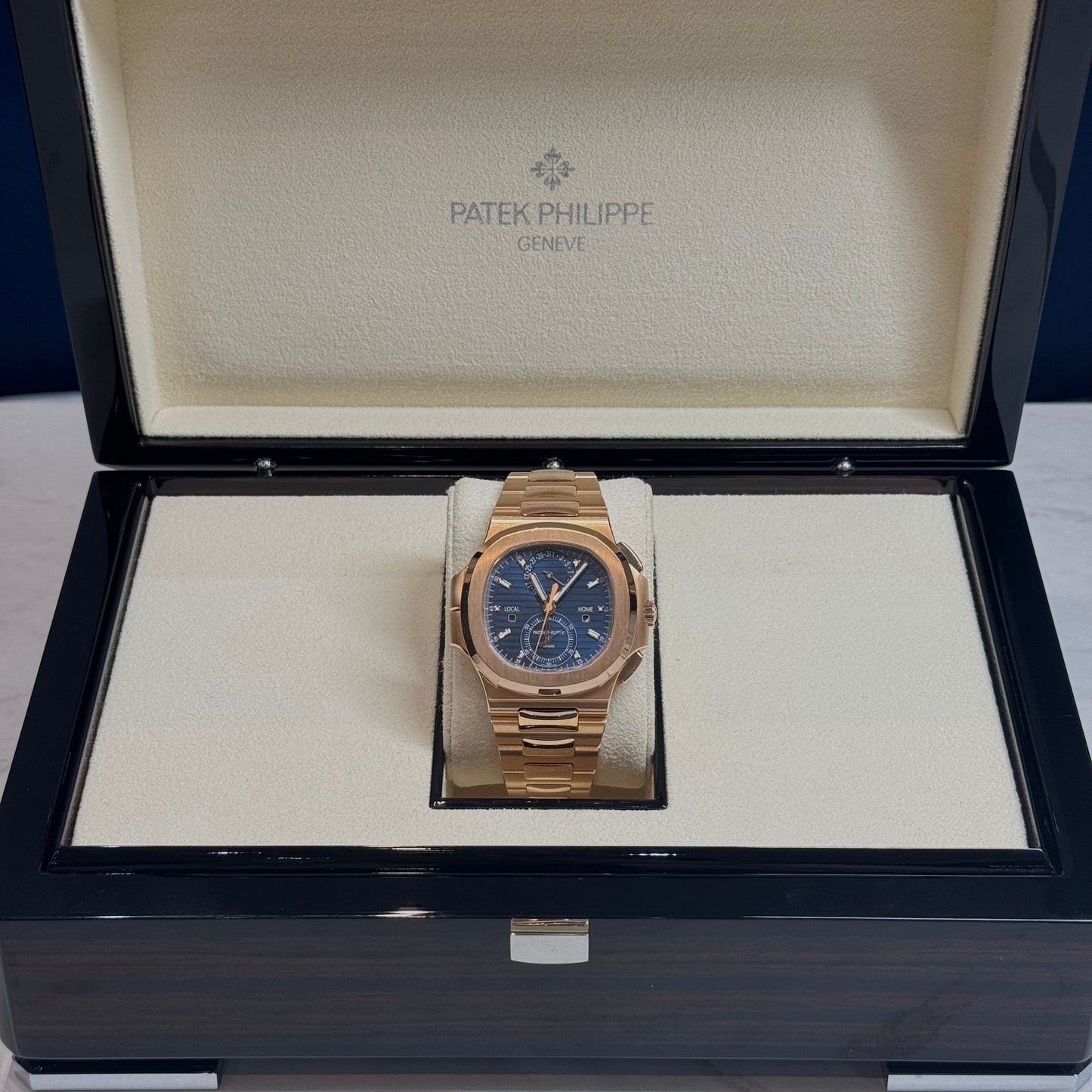 Patek Philippe Nautilus Travel Time 2024 Ref. 5990/1R-001 Regal - Hatton Garden Jewellers