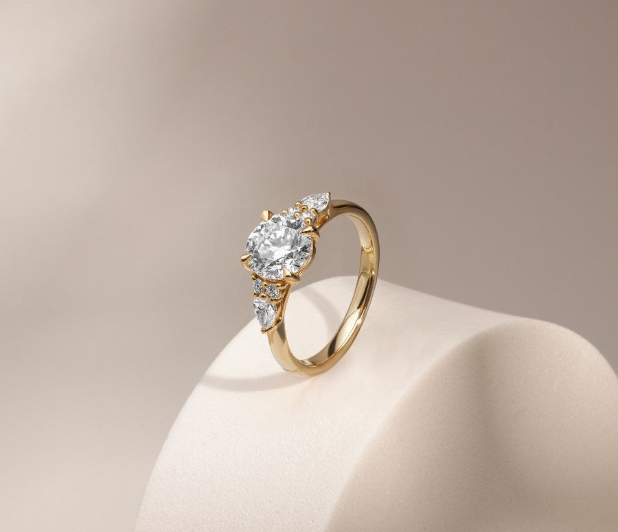 A yellow gold ring