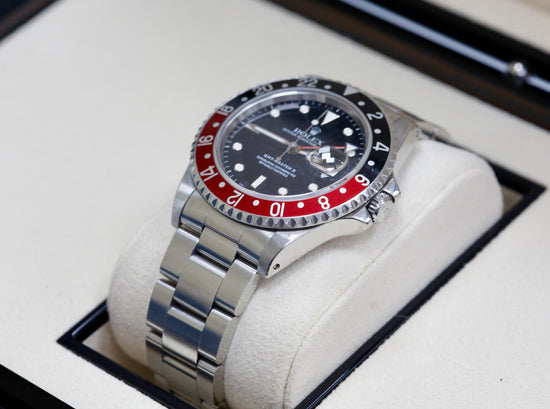 Rolex GMT Master "Coke" 1994 Regal - Hatton Garden Jewellers